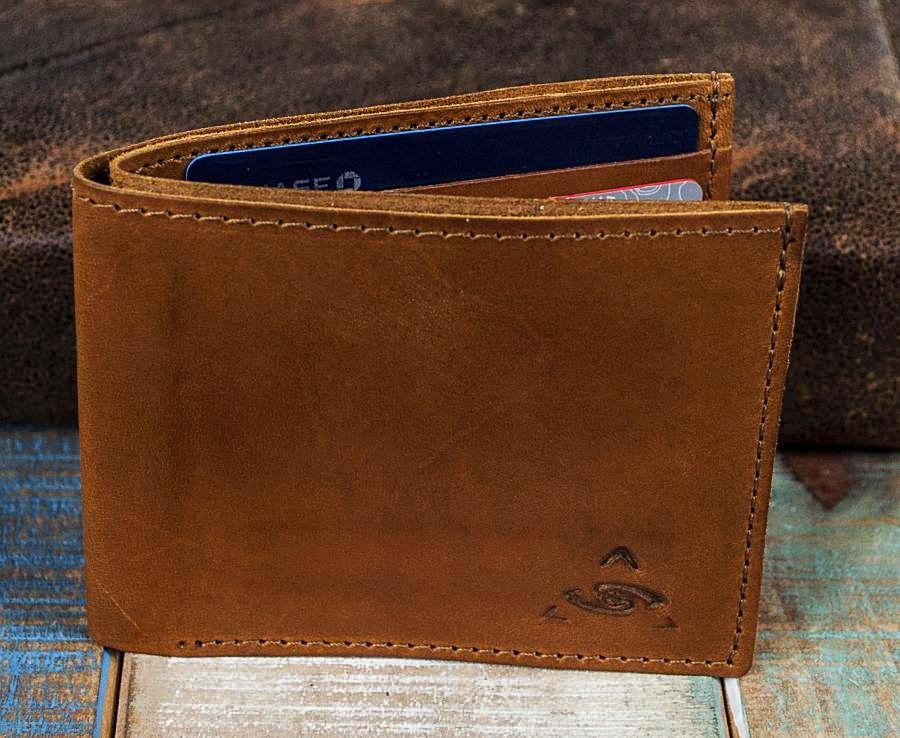 A brown calf leather bifold wallet, Circa 2018, Fine Watches